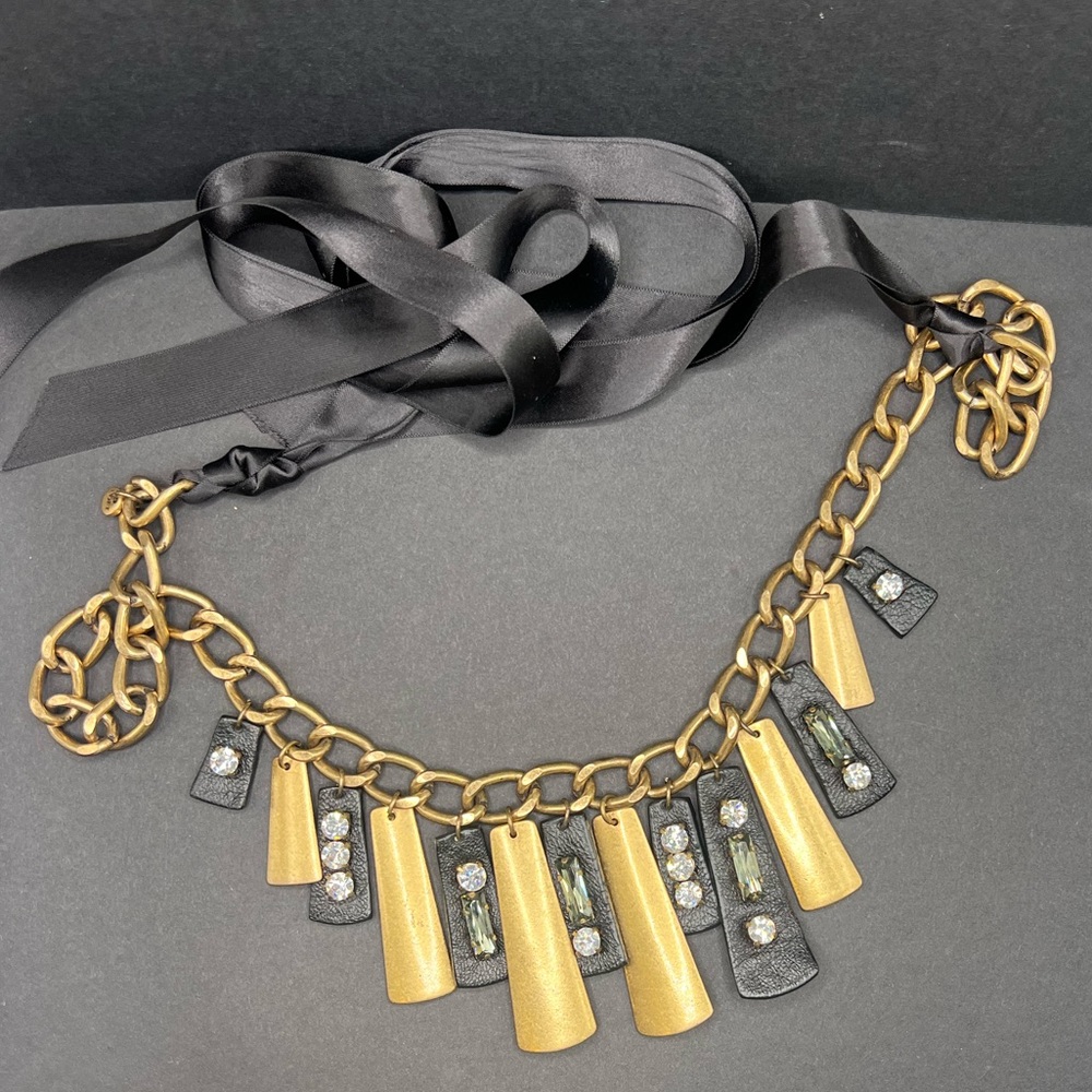 Necklace  brass and natural leather.